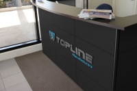 Topline Manufacturers - Logo